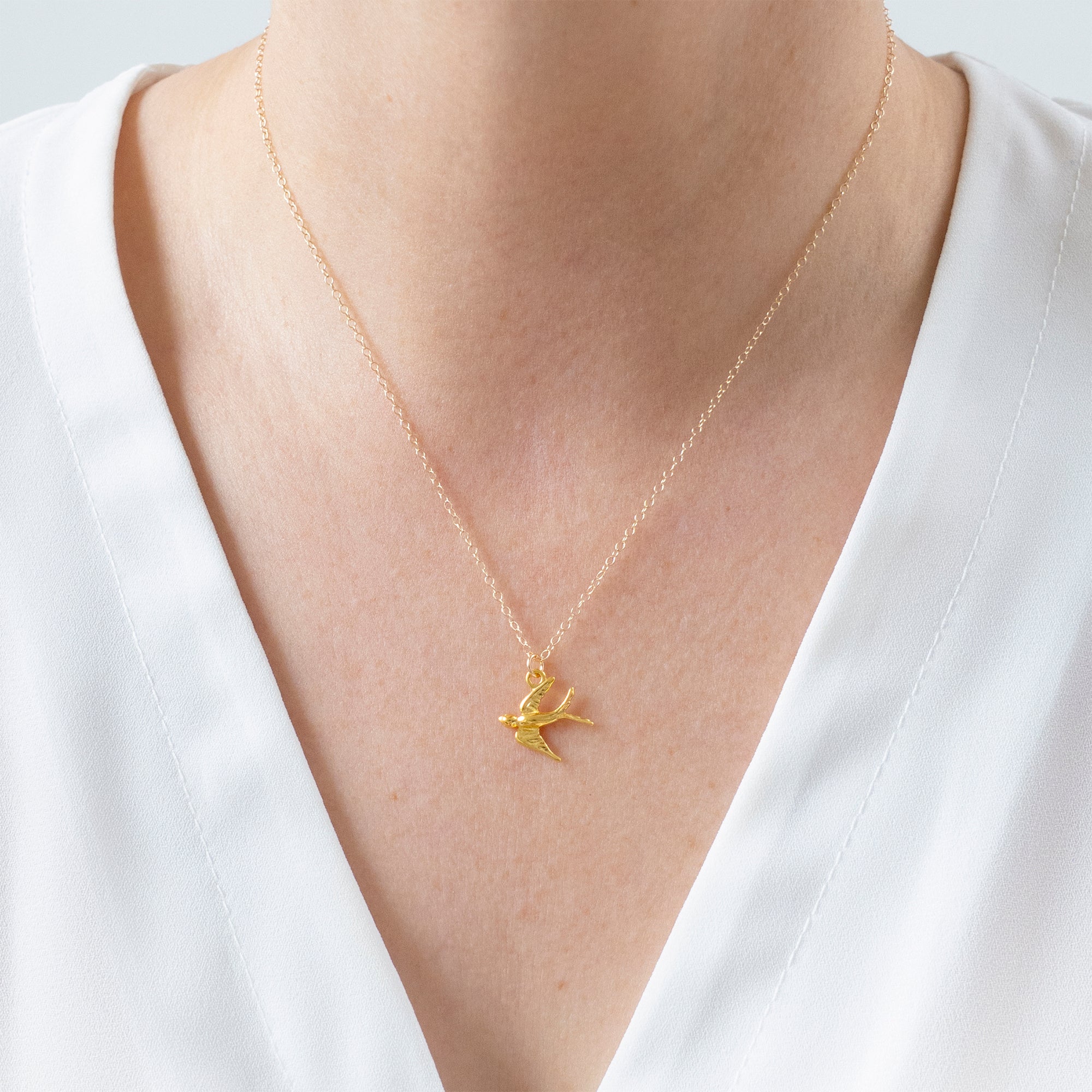 Gold Swallow Charm Necklace