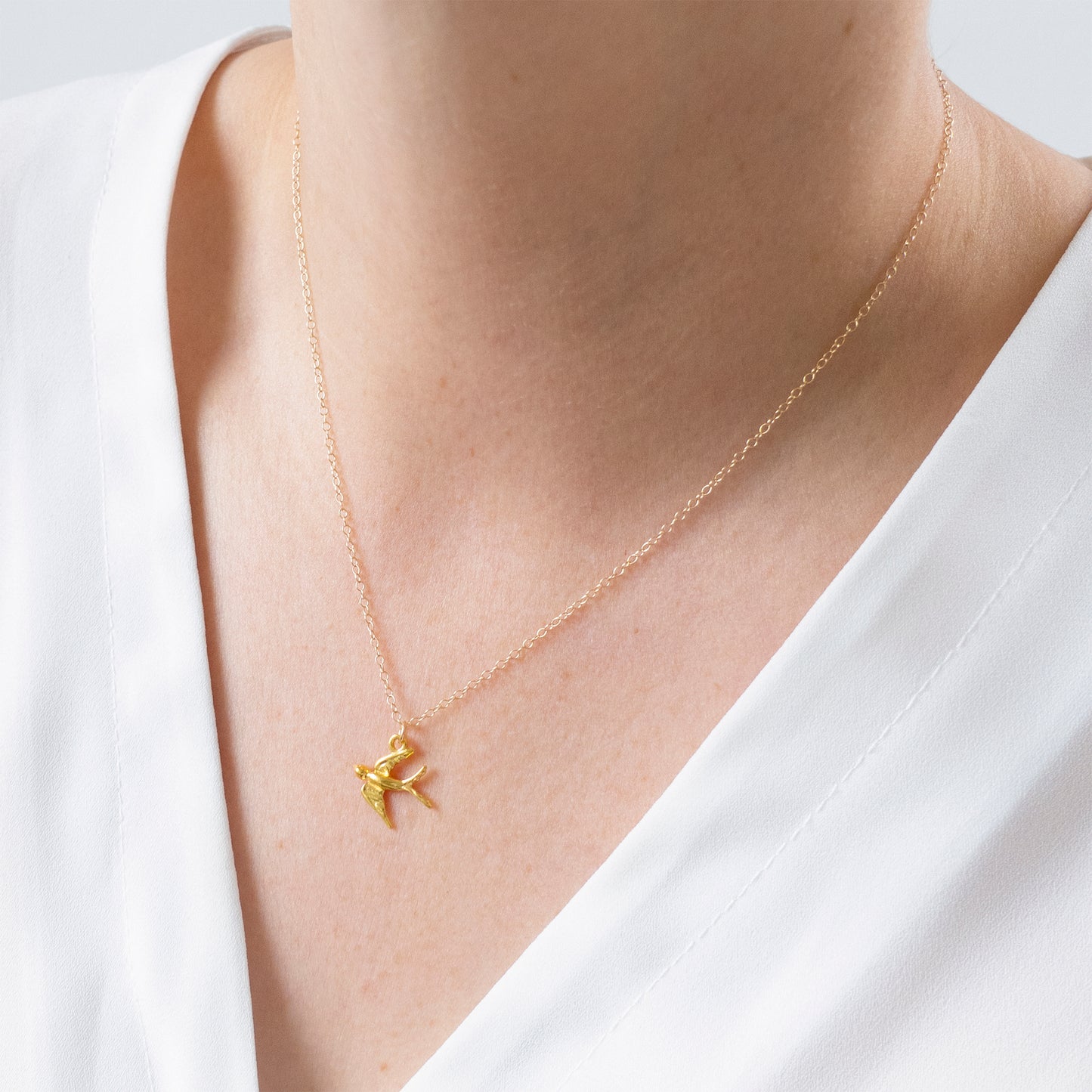 Gold Swallow Charm Necklace