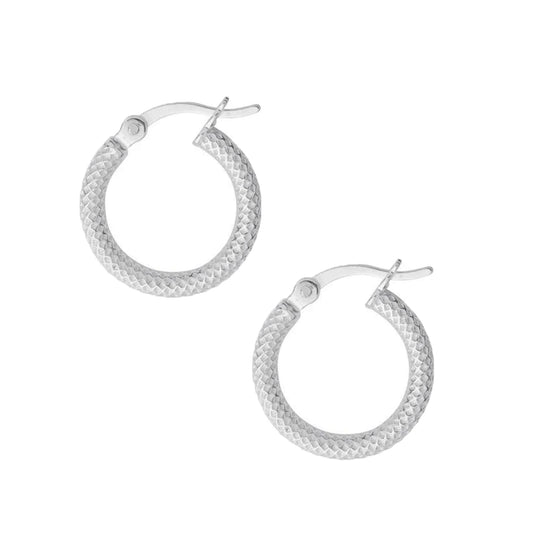 Pair of silver hoop earrings with a diamond cut pattern on a white background