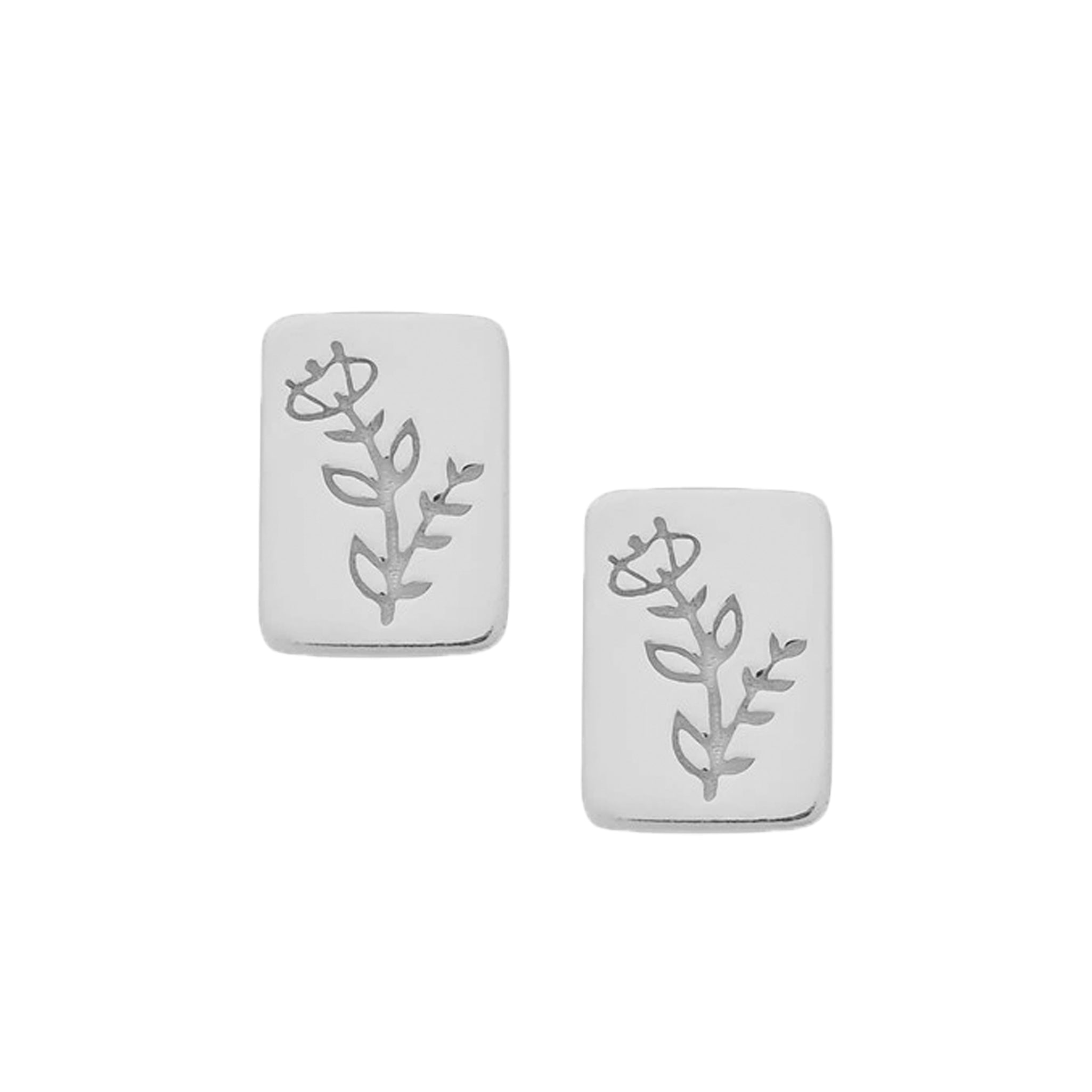 Pair of silver earrings with floral design on a white background